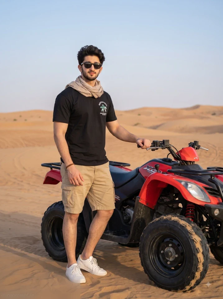 Man in black graphic T shirt and khaki cargo shorts standing beside a red quad bike on clean desert sand in a travel AI photo prompt for men